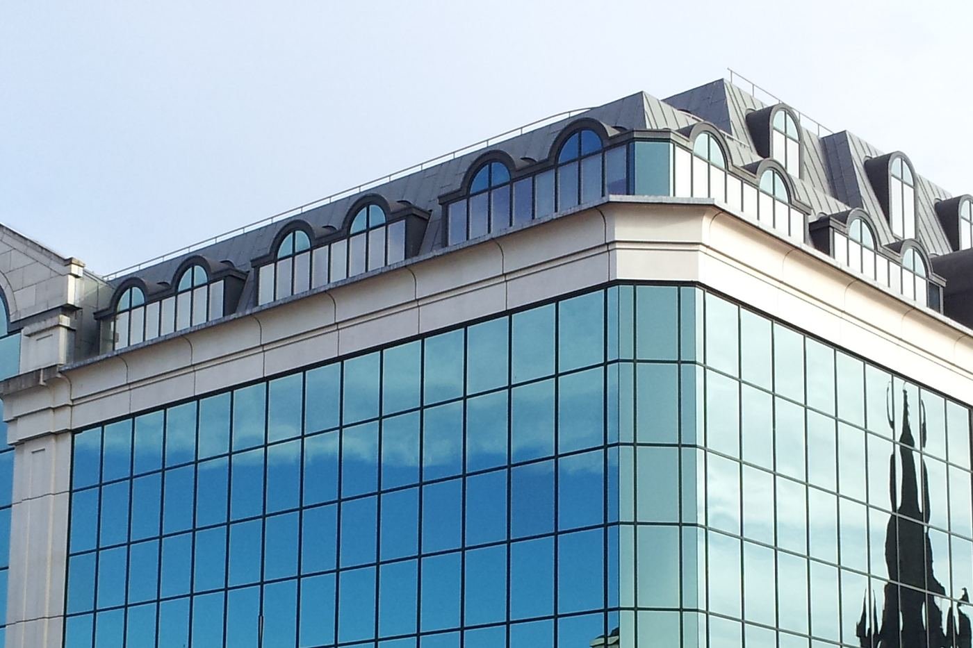 Close-up of a commercial office building glass facade